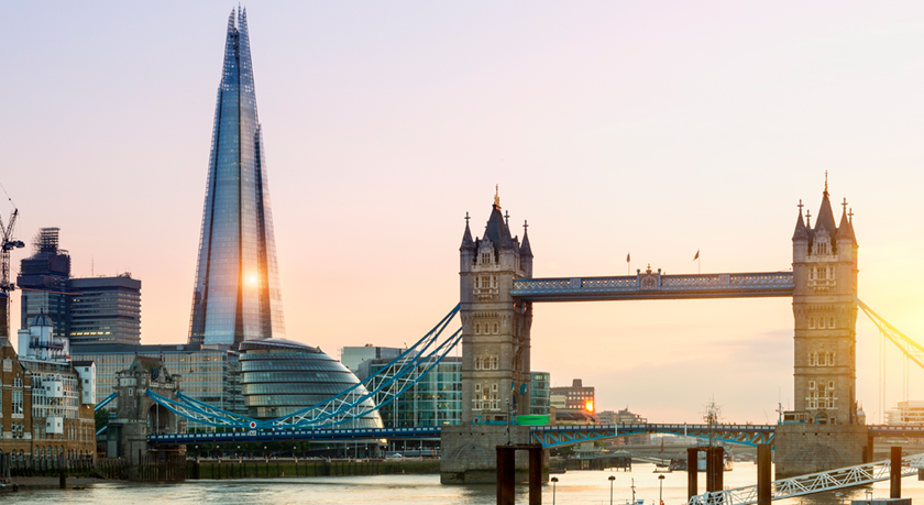 Sunset on the Thames River near Tower Bridge and The Shard in London, England
