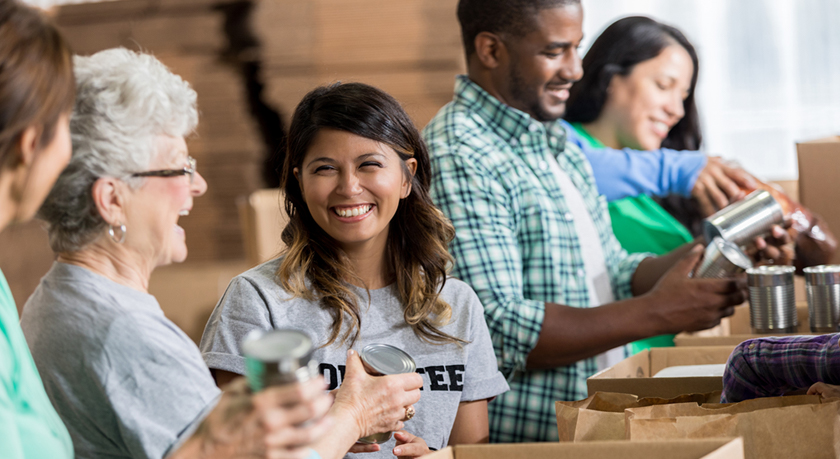 Employees helping at food drive