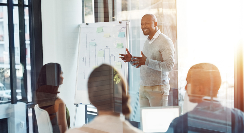 Businessman presenting to group