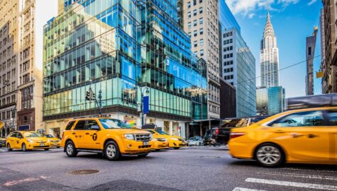 Yellow taxis on a busy street in New York City